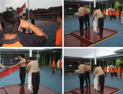 Tegap di Senja Hari: Anggota Pramuka Warga Binaan Lapas Banjarmasin Laksanakan Apel Penurunan Bendera